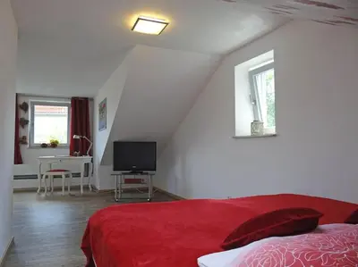 Ein Bett oder Betten in einem Zimmer der Unterkunft Die kleine Stadtoase
