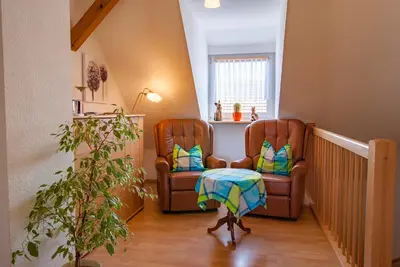 Ein Sitzbereich in der Unterkunft Dreiseitenhof Ferienwohnung Künzel
