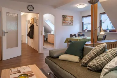 Ein Sitzbereich in der Unterkunft Ferienwohnung Am Waldrand