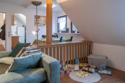Ein Sitzbereich in der Unterkunft Ferienwohnung Am Waldrand