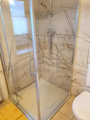 Ein Badezimmer in der Unterkunft Erzgebirgshütte