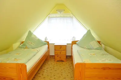 Ein Bett oder Betten in einem Zimmer der Unterkunft Ferienhaus Neubert