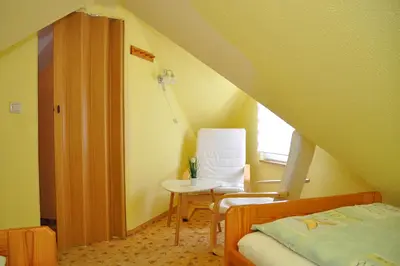 Ein Bett oder Betten in einem Zimmer der Unterkunft Ferienhaus Neubert