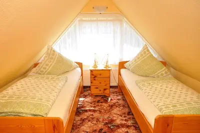 Ein Bett oder Betten in einem Zimmer der Unterkunft Ferienhaus Neubert