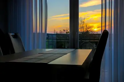 Blick auf den Sonnenuntergang/Sonnenaufgang von der Ferienwohnung aus oder aus der Nähe
