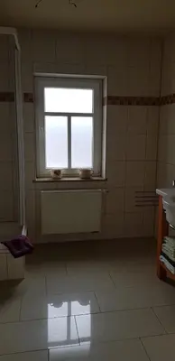 Ein Badezimmer in der Unterkunft Im Ballhaus Neuhilbersdorf
