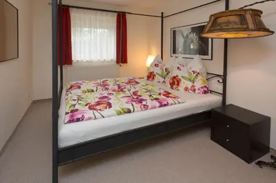 Ein Bett oder Betten in einem Zimmer der Unterkunft Ferienwohnung Moritzburg