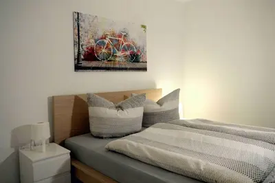Ein Bett oder Betten in einem Zimmer der Unterkunft Ferienwohnung am Rathaus