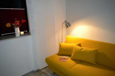 Ein Sitzbereich in der Unterkunft Ferienwohnung am Rathaus