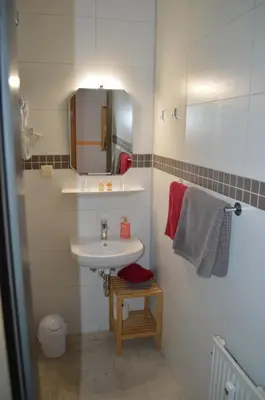 Ein Badezimmer in der Unterkunft Pension Tiffany
