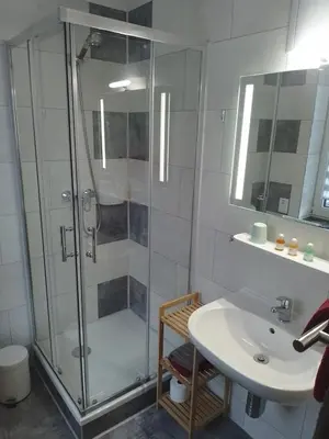 Ein Badezimmer in der Unterkunft Pension Tiffany