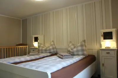 Ein Bett oder Betten in einem Zimmer der Unterkunft Festung Märcz