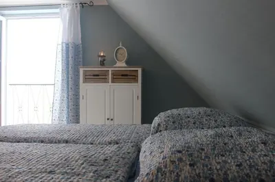 Ein Bett oder Betten in einem Zimmer der Unterkunft Festung Märcz