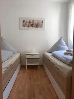 Ein Bett oder Betten in einem Zimmer der Unterkunft Ferienwohnung Johann Meyer