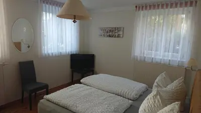 Ein Bett oder Betten in einem Zimmer der Unterkunft Altenberger Stadtvilla