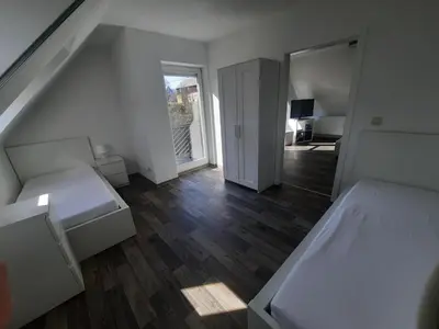 Ein Bett oder Betten in einem Zimmer der Unterkunft Ferienwohnung Berger