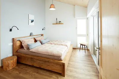 Ein Bett oder Betten in einem Zimmer der Unterkunft Beerenhaus