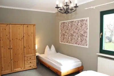 Ein Bett oder Betten in einem Zimmer der Unterkunft Ferienwohnung Muelenz