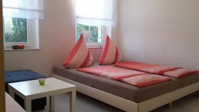 Ein Bett oder Betten in einem Zimmer der Unterkunft Ferienwohnung 