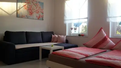 Ein Sitzbereich in der Unterkunft Ferienwohnung 