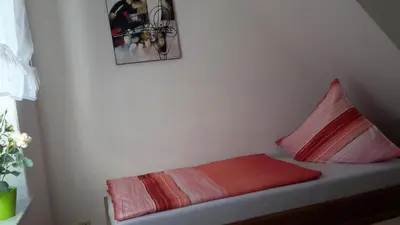 Ein Bett oder Betten in einem Zimmer der Unterkunft Ferienwohnung 