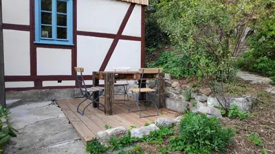 Ein Garten an der Unterkunft Ferienwohnungen Felsenkeller Bielatal