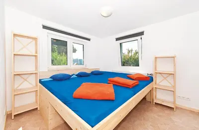Ein Bett oder Betten in einem Zimmer der Unterkunft Bergoase Hütte und Hostel Sauna Kamin Lagerfeuer