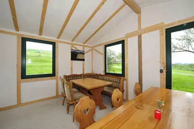 TV/Unterhaltungsangebot in der Unterkunft Bergoase Hütte und Hostel Sauna Kamin Lagerfeuer