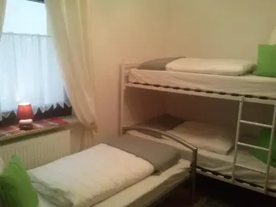 Ein Bett oder Betten in einem Zimmer der Unterkunft Ferienwohnung Karla - nahe Chemnitz
