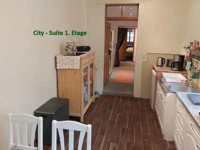 Ein Bett oder Betten in einem Zimmer der Unterkunft City-Ferienwohnungen-Dresden - zentral gelegen im Haus Louisenstrasse 11 - Dresden-Neustadt