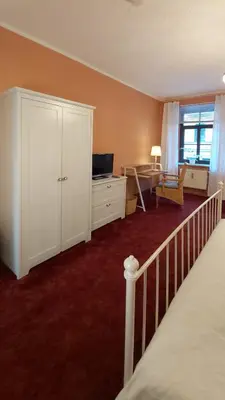 Ein Bett oder Betten in einem Zimmer der Unterkunft City-Ferienwohnungen-Dresden - zentral gelegen im Haus Louisenstrasse 11 - Dresden-Neustadt