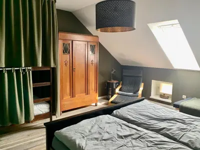 Ein Bett oder Betten in einem Zimmer der Unterkunft Bahnhof Frauenstein SCHLOSSBLICK