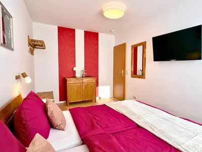 Ein Bett oder Betten in einem Zimmer der Unterkunft Ferienhaus Landeskrone für 10 Personen mit Sauna, Terrasse, inkl Parkplatz in Dresden