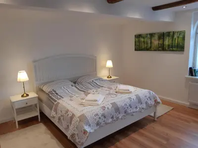 Ein Bett oder Betten in einem Zimmer der Unterkunft Haus Moritzburg