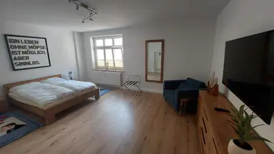 Ein Bett oder Betten in einem Zimmer der Unterkunft Haus Moritzburg