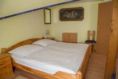 Ein Bett oder Betten in einem Zimmer der Unterkunft Apartment der Villa Elsa