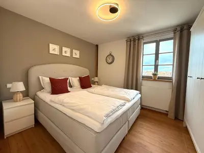 Ein Bett oder Betten in einem Zimmer der Unterkunft Landgut Mosch