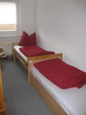 Ein Bett oder Betten in einem Zimmer der Unterkunft Ferienwohnung mit Aegidienblick