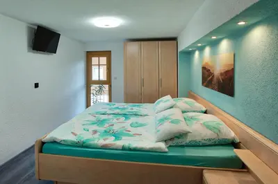 Ein Bett oder Betten in einem Zimmer der Unterkunft Ferienhaus Fam. Herklotz