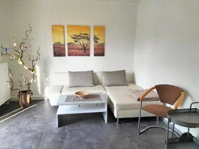 Ein Sitzbereich in der Unterkunft Pension Rosenvilla