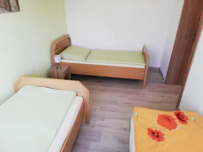 Ein Bett oder Betten in einem Zimmer der Unterkunft Ferienwohnung, Monteurwohnung