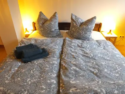 Ein Bett oder Betten in einem Zimmer der Unterkunft “Mägdestube” - Hammergut Neidberg