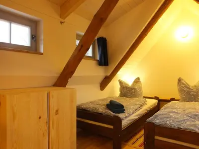 Ein Bett oder Betten in einem Zimmer der Unterkunft “Mägdestube” - Hammergut Neidberg