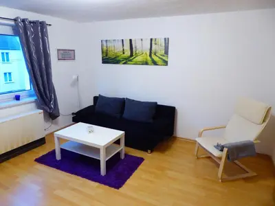Ein Sitzbereich in der Unterkunft Ferienwohnung zum Pinguin