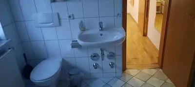 Ein Badezimmer in der Unterkunft Pension Sorrento