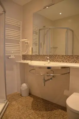 Ein Badezimmer in der Unterkunft Hotel Wehlener Hof