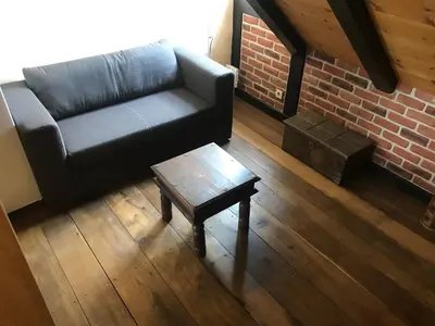 Ein Sitzbereich in der Unterkunft Gemütliche Ferienwohnung TURMZIMMER im Rittergut Leppersdorf bei Dresden