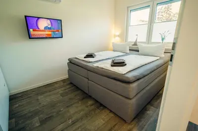 Ein Bett oder Betten in einem Zimmer der Unterkunft Lausitzer Edelquartier