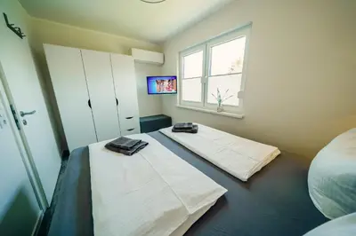 Ein Bett oder Betten in einem Zimmer der Unterkunft Lausitzer Edelquartier