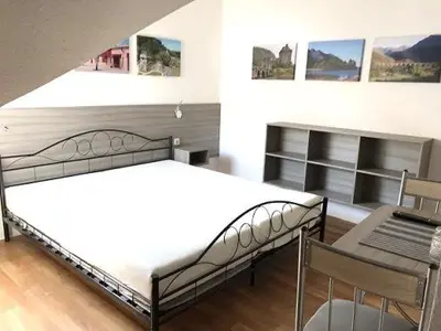 Ein Bett oder Betten in einem Zimmer der Unterkunft Pension Zentrum Riesa